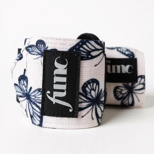 White wrist wraps with dark blue butterfly pattern and 'func' branding on a white background